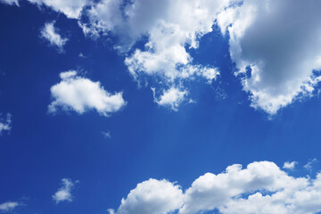 Blue sky with small cumulus clouds