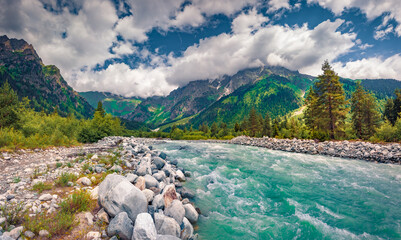 Azure river in Caucasus mountains. Spectacular summer scene of Upper Svaneti, Georgia, Europe.Beauty of nature concept background.. - obrazy, fototapety, plakaty