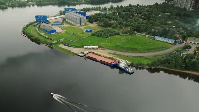 Loading on the Neva River, an industrial zone near the city, from a bird's-eye view