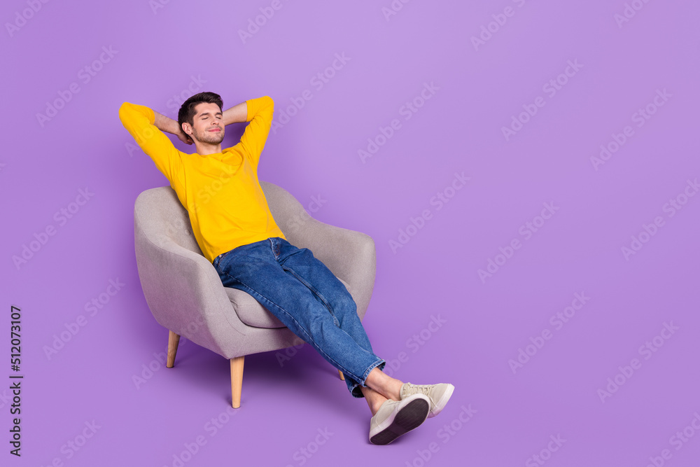 Poster full size photo of good mood calm peaceful man sit comfy armchair have a nap isolated on violet colo