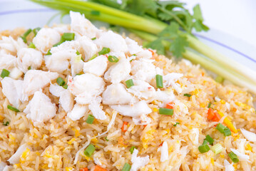 Crab fried rice on the white dish. Favorite food of Thailand.