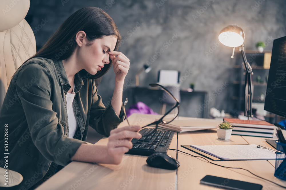 Aufkleber profile side view portrait of attractive sick tired girl tech support expert working late evening at