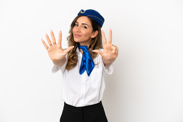 Airplane stewardess over isolated white background counting eight with fingers