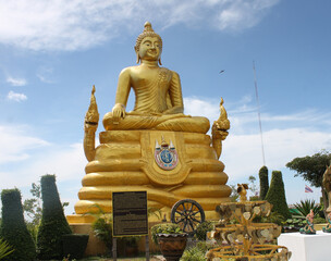 seated golden buddha statue in thailand