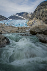 a glacial river beneath the melting glacier of Patagonia.