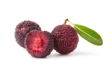 whole and half of fresh waxberry  with green leaf isolated on white.