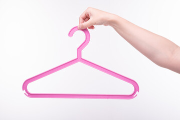 Pink plastic clothes hanger