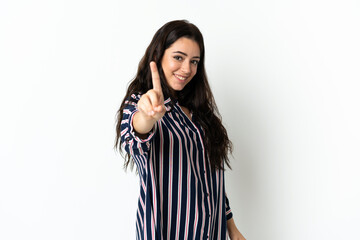 Young caucasian woman over isolated background showing and lifting a finger