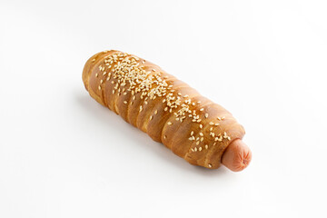 Sausages in dough on a white background