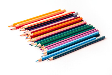 Fototapeta premium Colored pencil set, sharpened pencils of different colors. Copy space