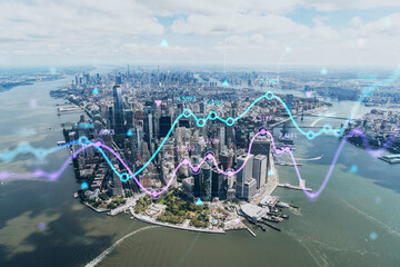 Aerial panoramic helicopter city view on Lower Manhattan district and financial Downtown, New York, USA. Forex graph hologram. The concept of internet trading, brokerage and fundamental analysis