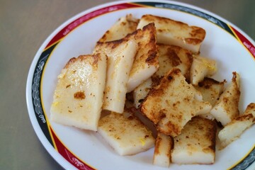 Crispy Taiwanese traditional cuisine turnip cake for breakfast