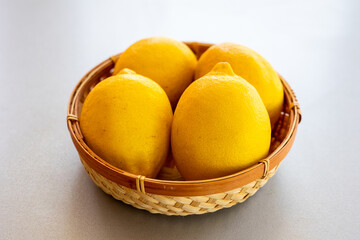 Fresh lemons close up in kitchen table