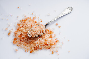 pink Himalayan salt on a white background