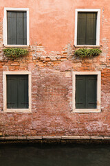 Fototapeta na wymiar old window with shutters in venice, italy 