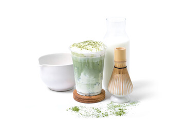ice green tea milk with matcha powder and Matcha bamboo whisk isolated on white background. coffee shop cafe menu concept.
