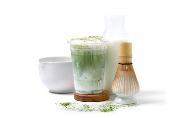 ice green tea milk with matcha powder and Matcha bamboo whisk isolated on white background. coffee shop cafe menu concept.