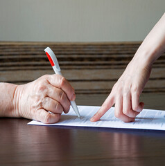 An old woman is forced to write a will for an apartment
