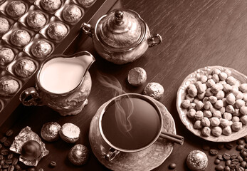 Obraz na płótnie Canvas Sweets on the background of coffee still life