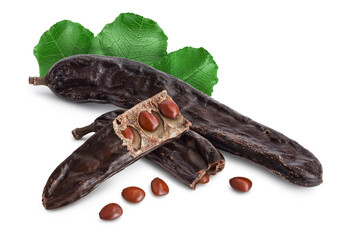 Ripe carob pods and bean isolated on white background with full depth of field