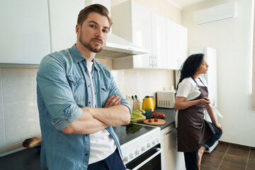 Young couple ignoring each other after altercation