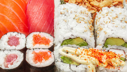  Sushi rolls set as a background. Japan restaurant menu. Sushi with salmon, tuna and avocado. T