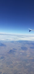 Fototapeta na wymiar Clear sky view from the airplane wing