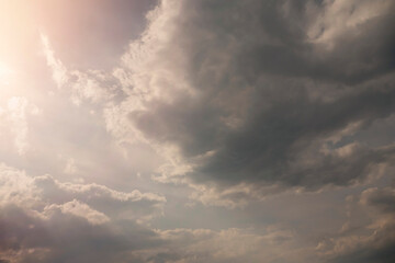 Stunning cloudscape with sun shine and flare. Abstract nature background for design purpose.