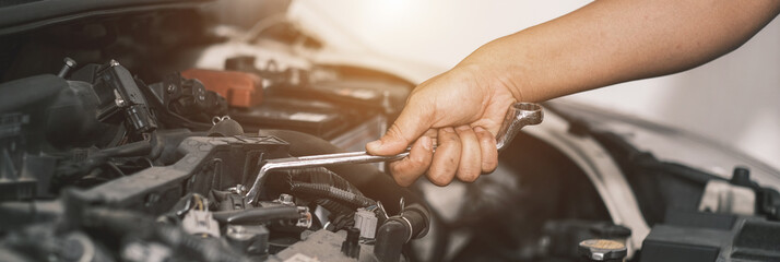 Fixing automotive engine, car service and maintenance, Repair service, repairman hands repairing a...