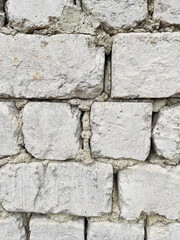 Carpic masonry of white stone, background image