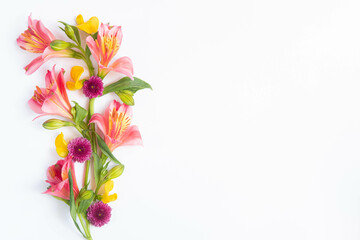 Festive floral background. floral layout from peach and orange flowers on a white background isolated.