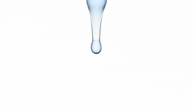 Close up macro shot of drops of blue clear liquid are falling down from lab dropper on white background | Abstract body care cosmetics with plant oils formulation concept