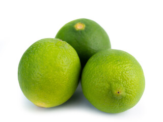 Fresh ripe green limes isolated on white background. (clipping path)