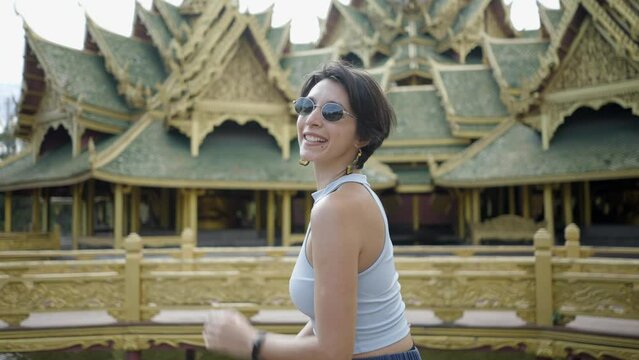 Beautiful Woman At The Historic Museum Temples In Muang Boran Ancient City In Bangkok, Thailand. Medium Shot