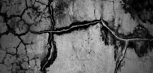 Abstract texture of scratched and cracked wall.Unlimited abstract concrete black and white background wallpaper.