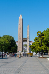 View of the Obelisk of Theodosius and the Obelisk of Constantine in Istanbul from the end of the Hippodrome, on a sunny day