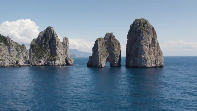 Faraglioni Rocks on the coast, island of Capri, Italy - Birds eye view of tourist attraction, scenic spot.