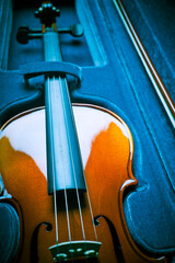 classic violin music instrument into its case