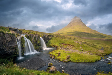 Mount Kirkjufell (the church mountain) and  Kirkjufellfoss waterfalls, beautiful landscape in Snaefellsnes peninsula, Iceland