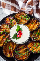 grilled eggplant on Georgian on a gray stone background