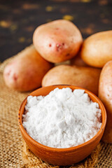 potato starch on a dark rustic background