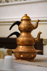 Turkish copper teapot with teapot close-up.