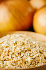 dried onions on a black wooden rustic background