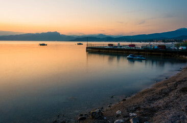 Coast of Garda Lake at the evening during sunset