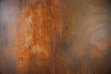 rust steel plate background and texture. abstract art rusty wall with dark vignette.