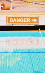 swimming pool sign in the pool