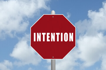 The word Intention on a red stop sign.