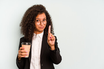 Young business Brazilian woman holding take away coffee isolated on white background showing number one with finger.