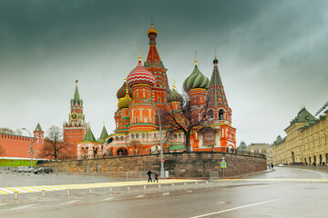 Beautiful view of Moscow Red Square Kremlin towers. Moscow architecture, Russia - in a cloudy weather. It is world famous tourist spot - Saint Basil's cathedral in background.