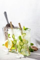 Summer refreshing or detox drinks, lemon cucumber mint infused water, hard light and shadows